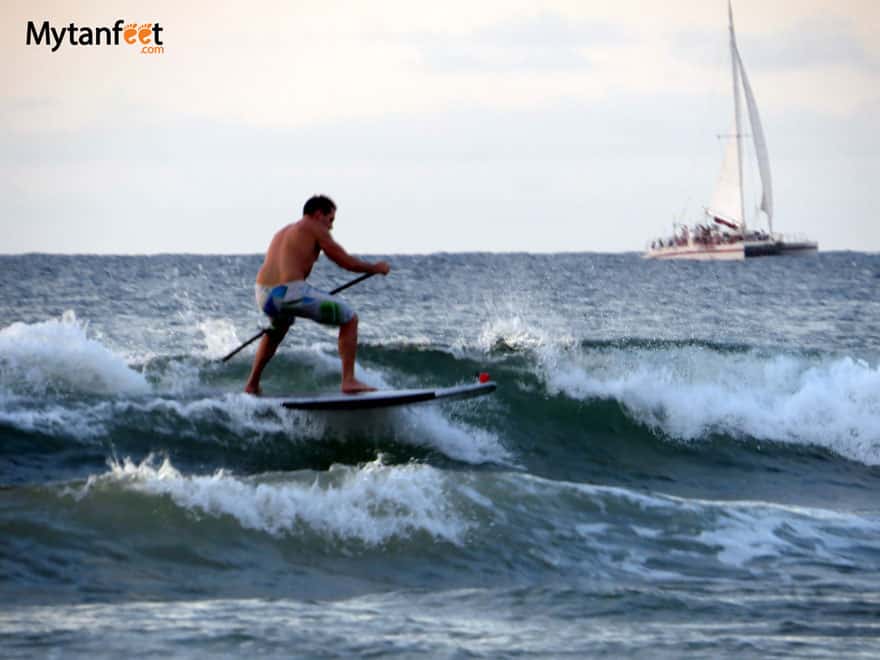 things to do in Tamarindo - stand up paddle board or surf things to do in Tamarindo - stand up paddle board or surf