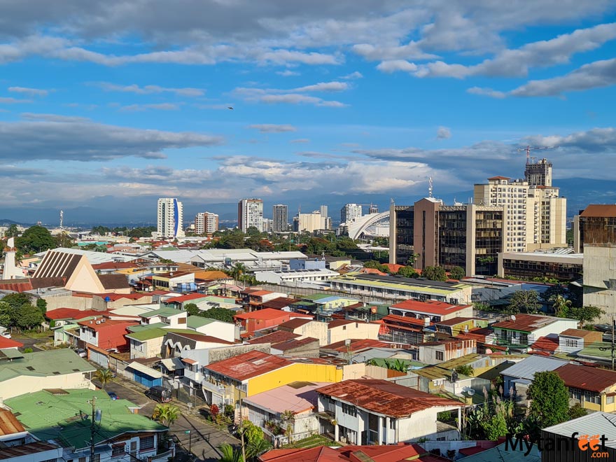 costa rica in november san jose. Photo of a city in Costa Rica, with blue skies and small cpolorful rooftop buildings 