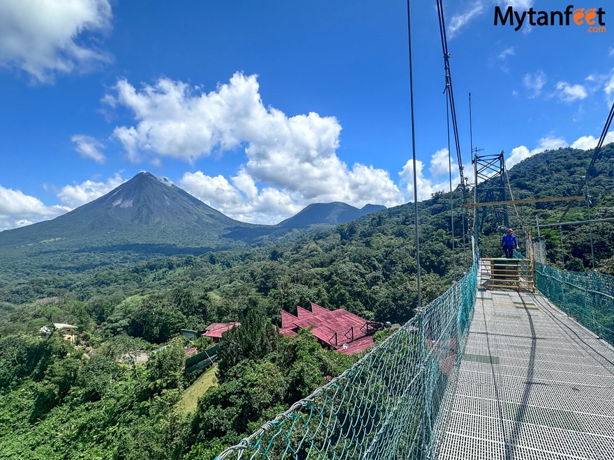 A photo of a suspended bridge, over looking the rainforest and Arenal Volcano in Costa Rica at sky Adventures in La Fortuna 