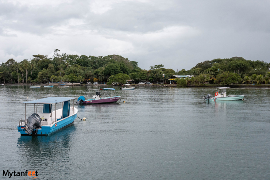 Fishing boats are in the water, in puerto Jimenez, Costa Rica