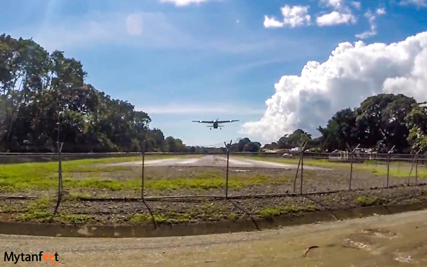 A small plane is taking off in a local airstrip in Puerto Jimenez, Costa Rica