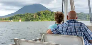 sunset view on boat at lake arenal tour booking page featured image